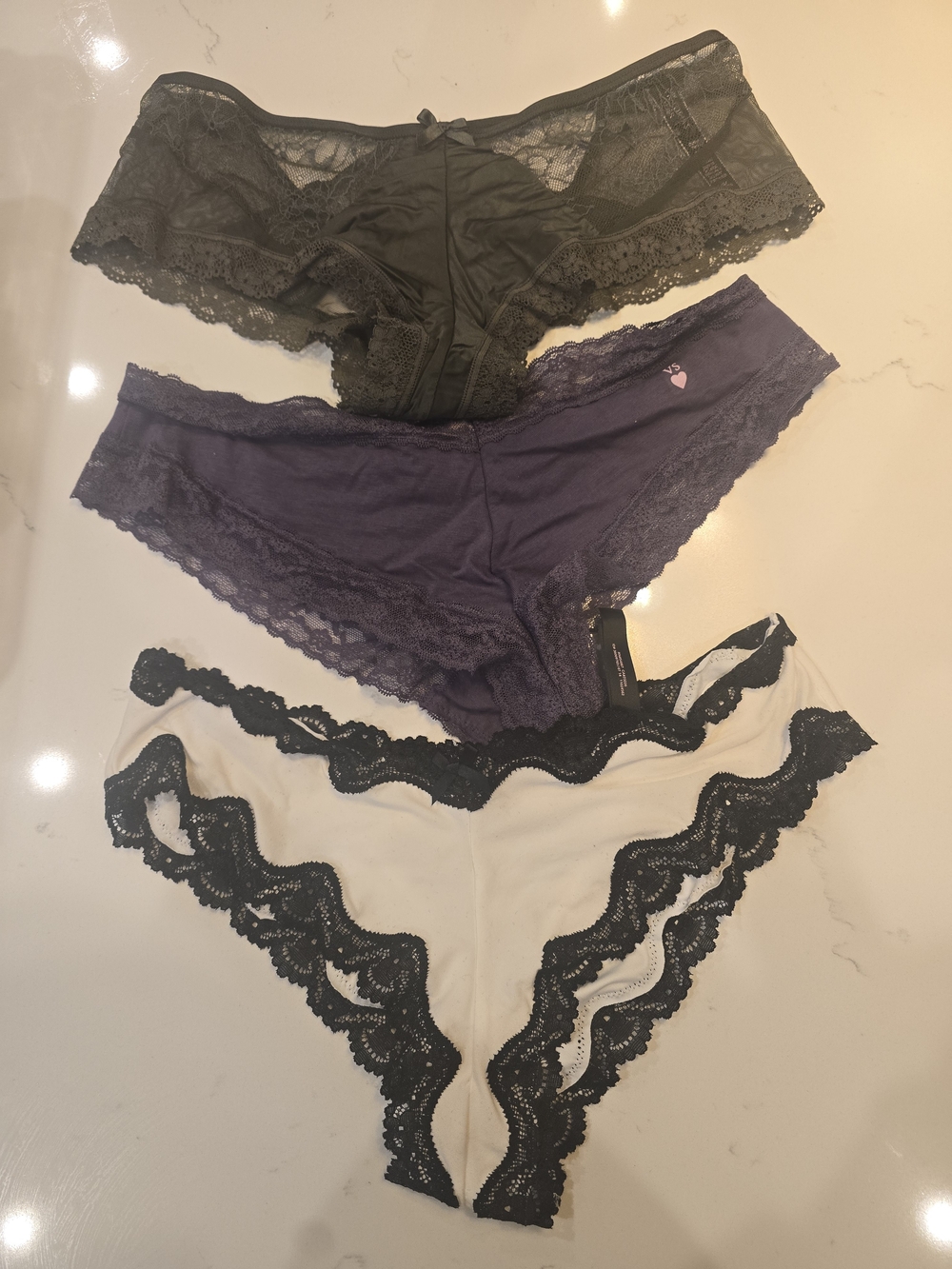 Victoria's Secret Three-Pack Lace Bikini Panties - Black, Purple, Cream
